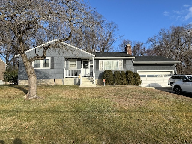 single story home with a front yard and a garage