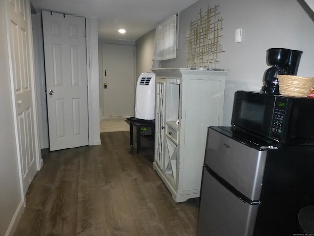 interior space with dark wood-type flooring