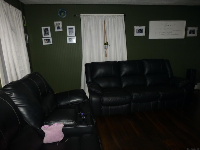 living room featuring a textured ceiling