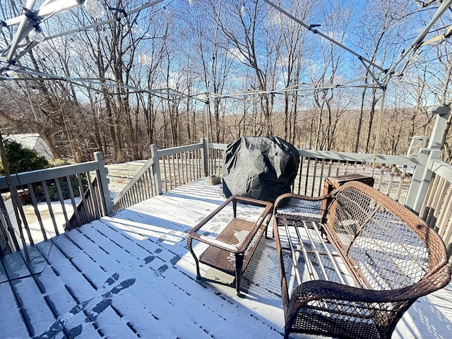 view of snow covered deck