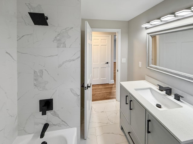 bathroom with vanity and washtub / shower combination