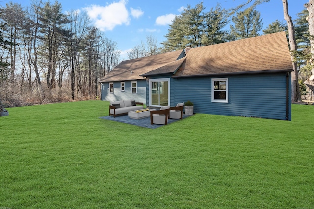 rear view of property with a lawn, an outdoor hangout area, and a patio