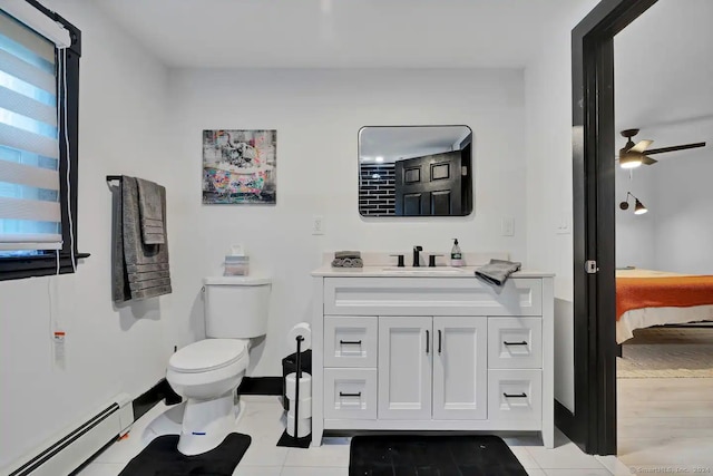 bathroom featuring vanity, tile patterned floors, ceiling fan, toilet, and a baseboard radiator