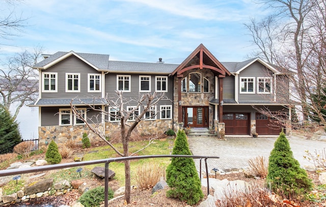 view of front of house with french doors and a garage