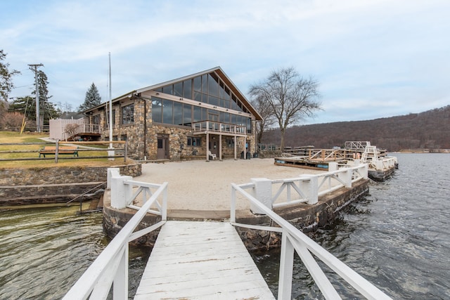 dock area with a water view