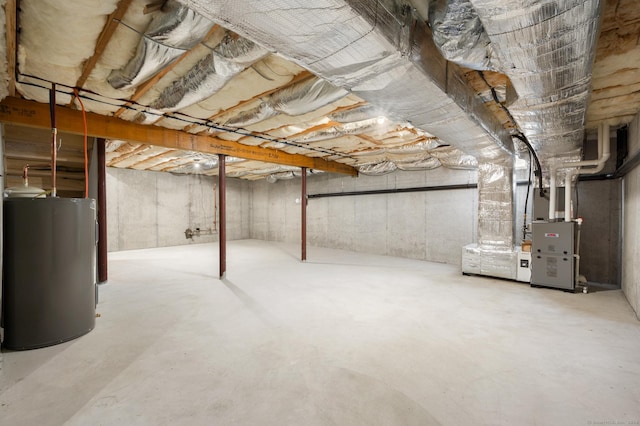 basement featuring electric water heater