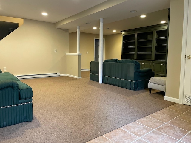 interior space featuring carpet floors and a baseboard heating unit