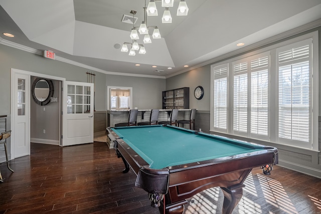 game room with a raised ceiling, ornamental molding, dark hardwood / wood-style floors, and billiards