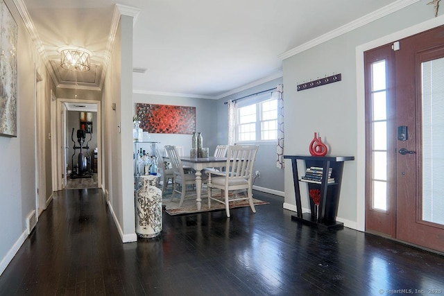 dining area featuring dark hardwood / wood-style flooring and ornamental molding