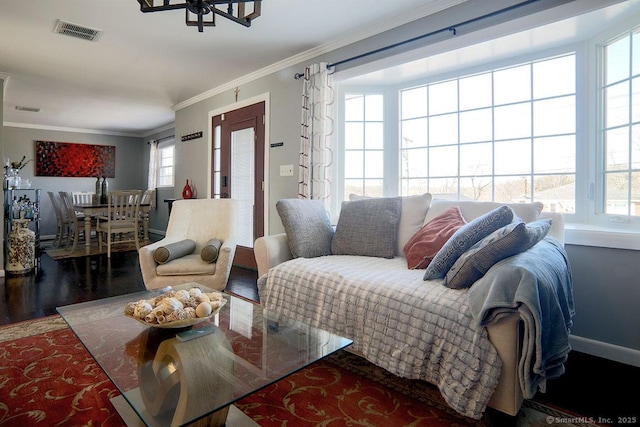 living room with ceiling fan, ornamental molding, and hardwood / wood-style floors