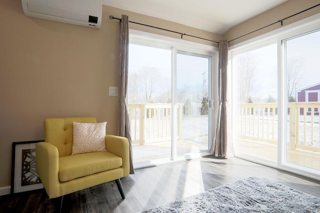 sitting room with a wall unit AC