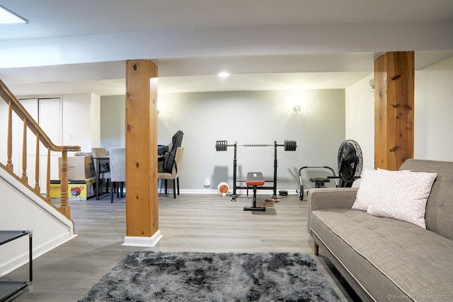 workout area with hardwood / wood-style flooring