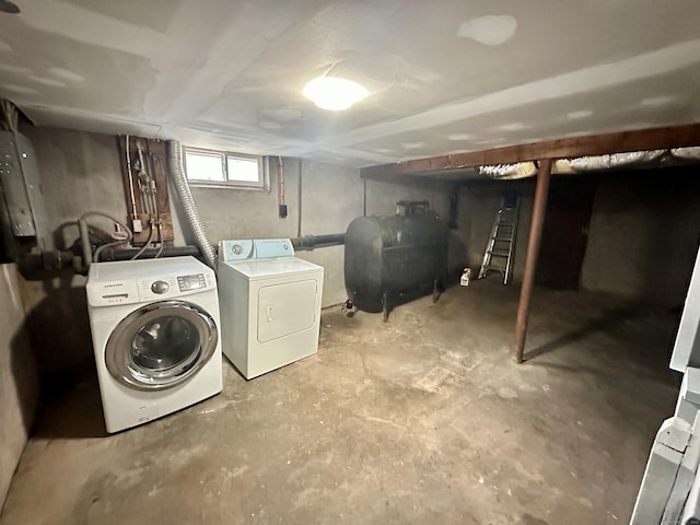 washroom with independent washer and dryer