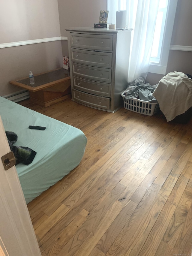 bedroom featuring light hardwood / wood-style floors