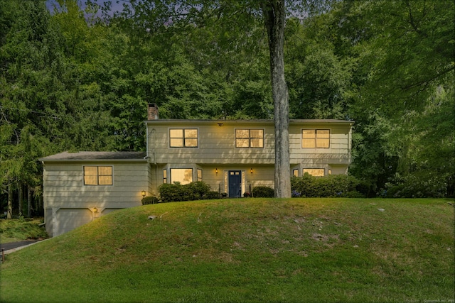 view of front of house with a front lawn