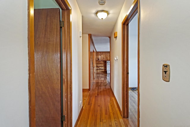 corridor featuring light hardwood / wood-style floors