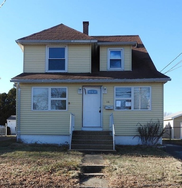 view of front facade with a front lawn