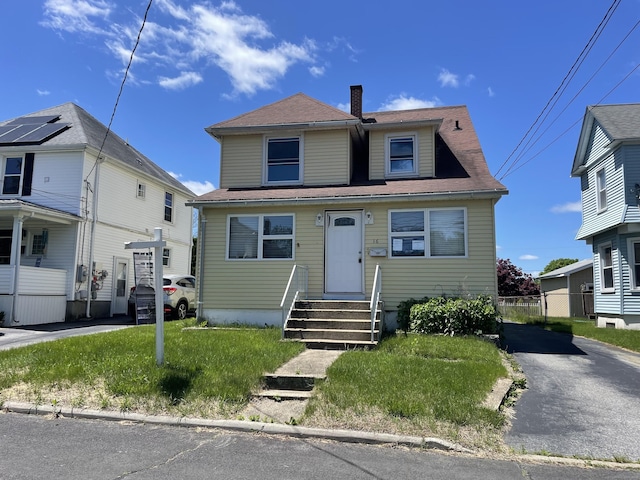 16 Clifton St, Waterford, CT 06385 - view of front of home featuring a chimney
