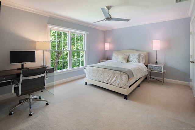 bedroom featuring crown molding, ceiling fan, and light carpet