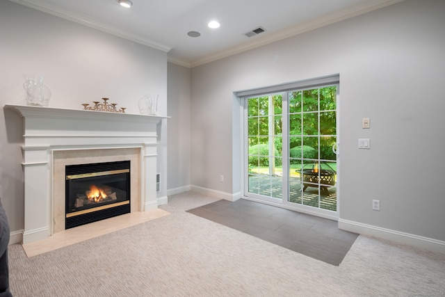 unfurnished living room featuring ornamental molding