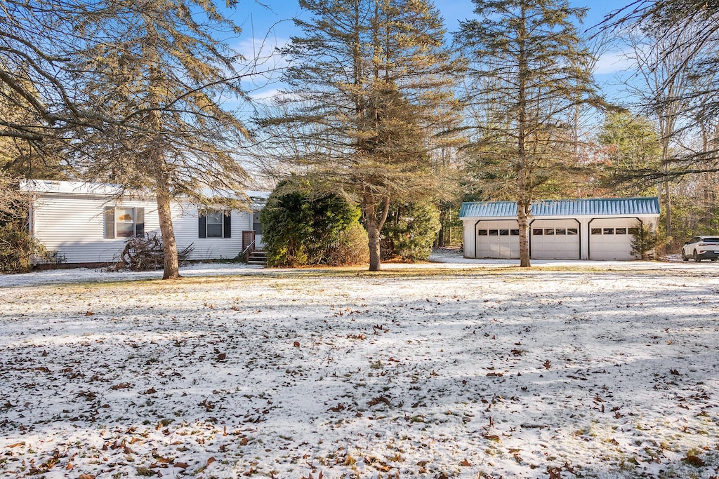 104 Hanover Rd, Canterbury, CT 06331 - view of front of home featuring an outbuilding and a garage