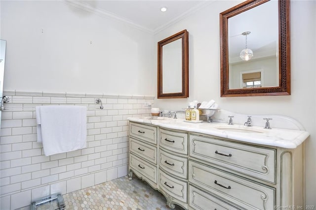 bathroom featuring tile patterned flooring, vanity, tile walls, and ornamental molding