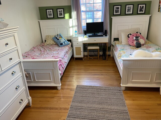 bedroom with wood-type flooring