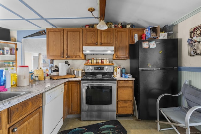 kitchen featuring light stone countertops, black fridge, sink, dishwasher, and stainless steel electric range