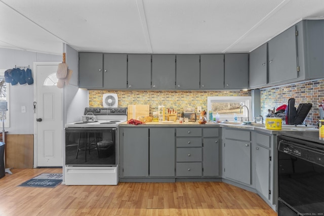 kitchen with gray cabinetry, white range with electric stovetop, sink, light hardwood / wood-style flooring, and dishwasher