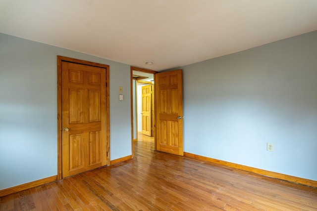 empty room with light wood-type flooring