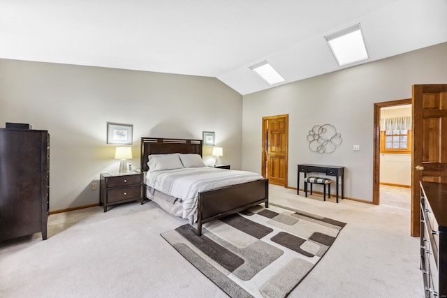 carpeted bedroom featuring lofted ceiling