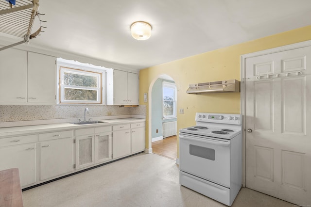 kitchen featuring sink, white cabinets, exhaust hood, and white electric range