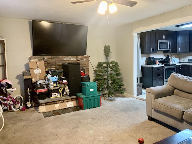 living room featuring carpet flooring and ceiling fan