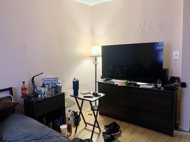 bedroom with light hardwood / wood-style flooring