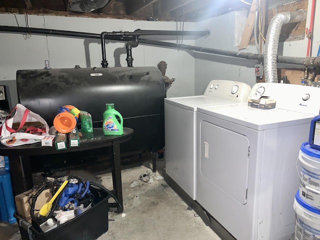 laundry room featuring separate washer and dryer