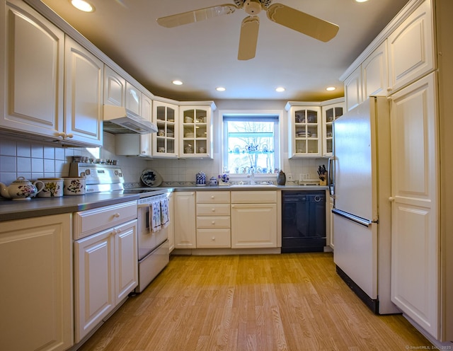 kitchen with dishwasher, white refrigerator, range with electric stovetop, light hardwood / wood-style floors, and white cabinets