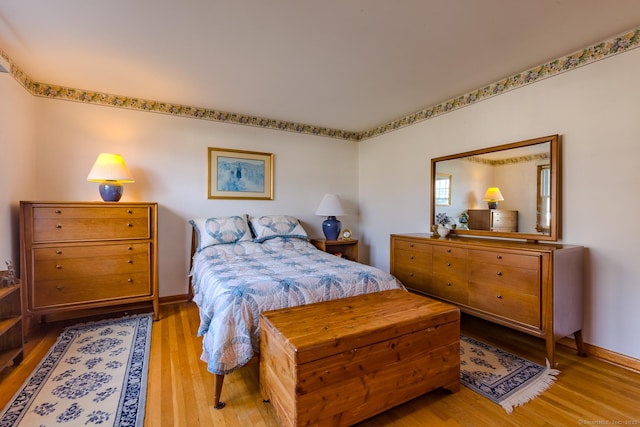 bedroom with light wood-type flooring