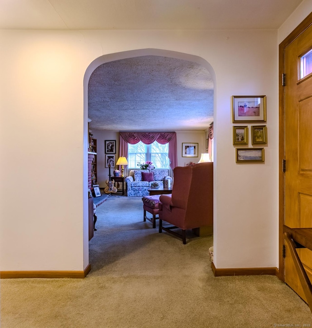 hallway with carpet