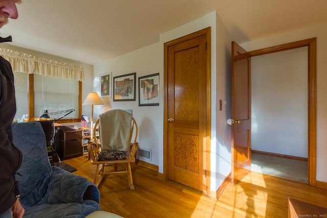 living area featuring light hardwood / wood-style flooring