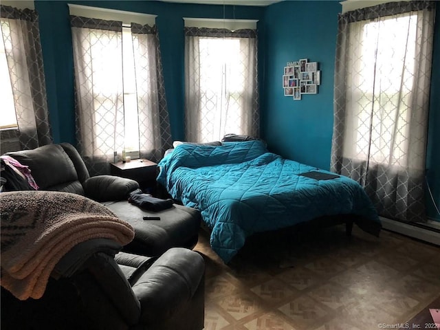 bedroom featuring parquet floors