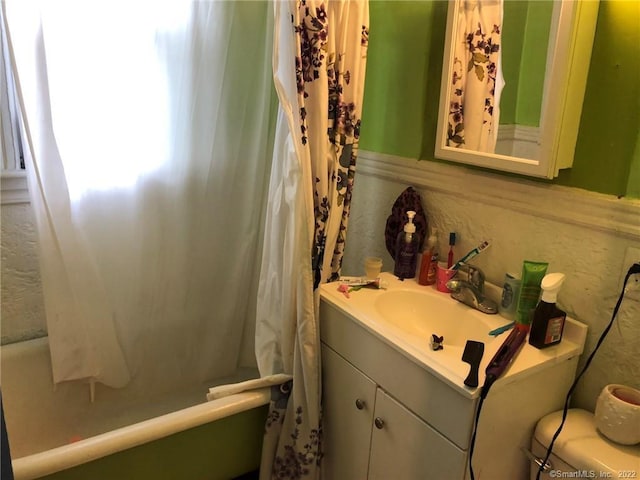 bathroom with vanity and shower / bathtub combination with curtain