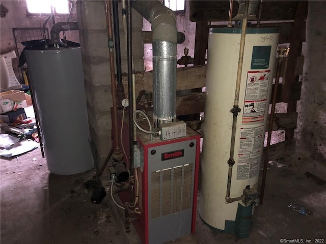 utility room featuring gas water heater