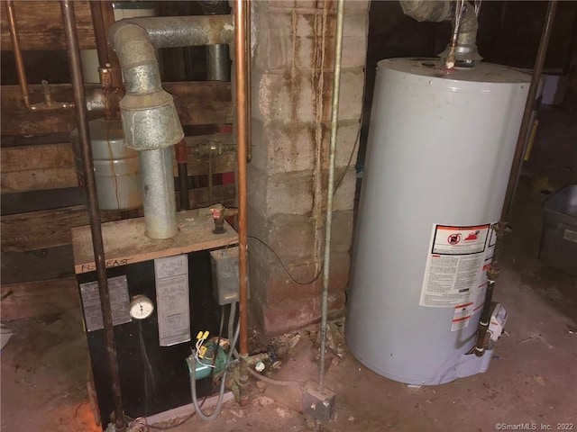 utility room featuring water heater