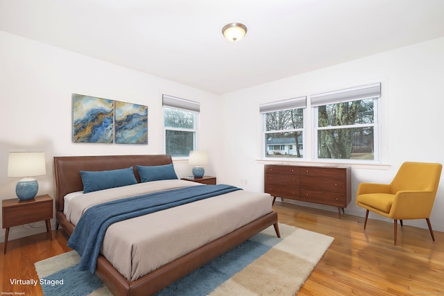 bedroom featuring light wood-type flooring