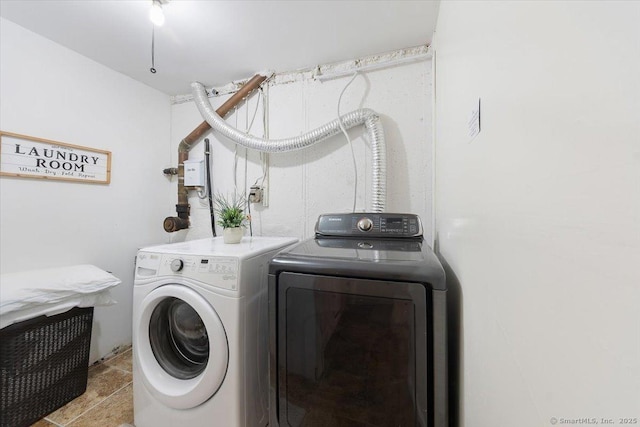 laundry room featuring separate washer and dryer