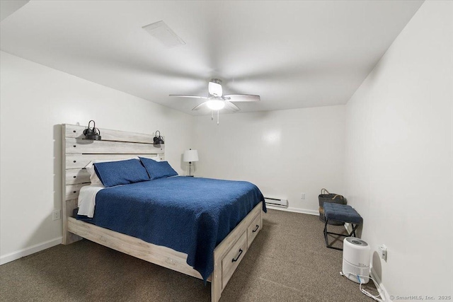 carpeted bedroom with baseboard heating and ceiling fan