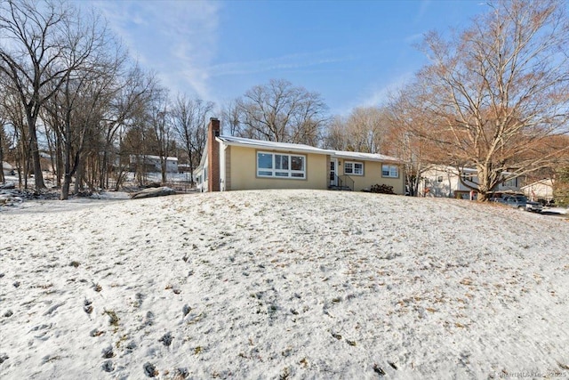 view of snow covered property