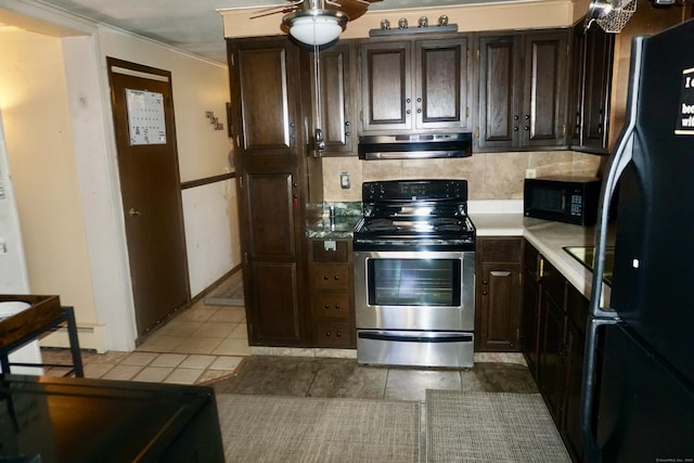 kitchen featuring dark brown cabinetry, black appliances, ventilation hood, ceiling fan, and light tile patterned floors