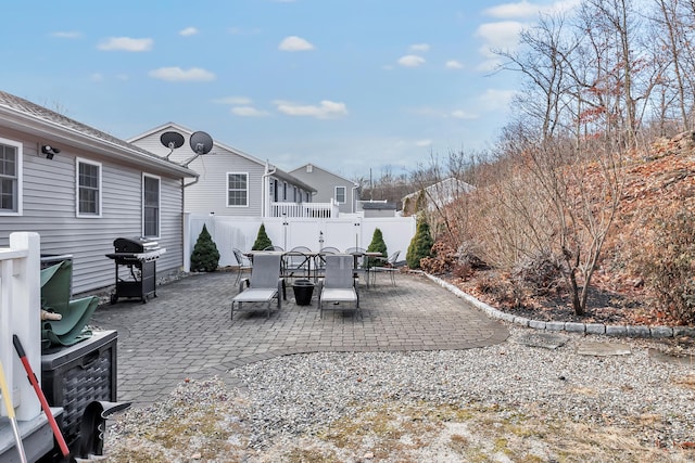 view of patio featuring a grill