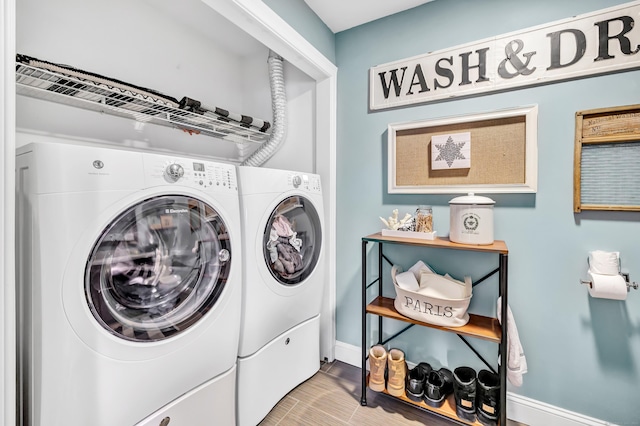 laundry room with separate washer and dryer